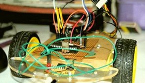 Rakesh Mondal with Custom made robots and small bots along with tutorials